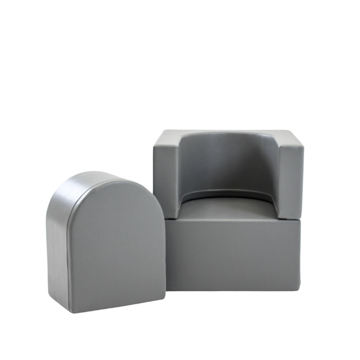 Graue Sitzmöbel mit abgerundeten Kanten und minimalistischer Form