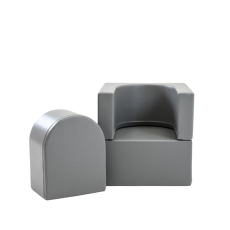 Graue Sitzmöbel mit abgerundeten Kanten und minimalistischer Form