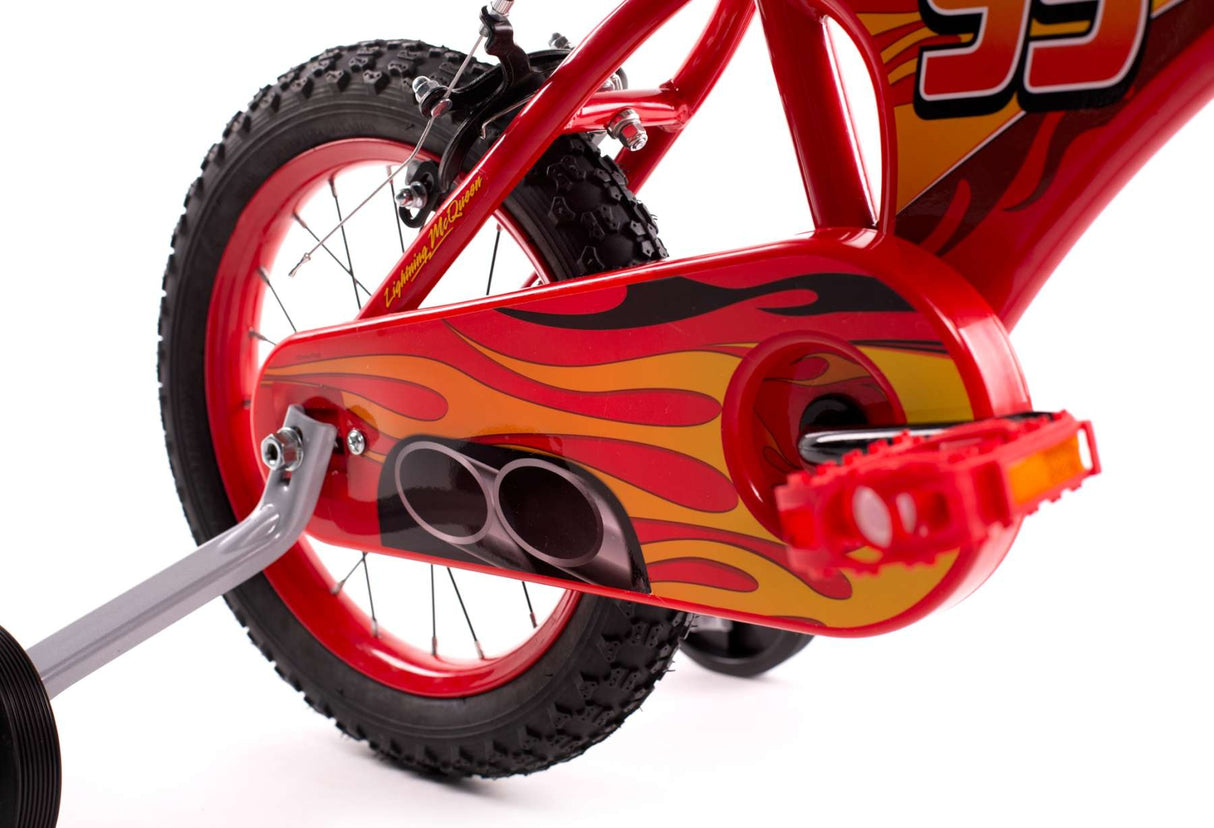 Rotes Kinderfahrrad mit Flammenmuster und stabilen Reifen