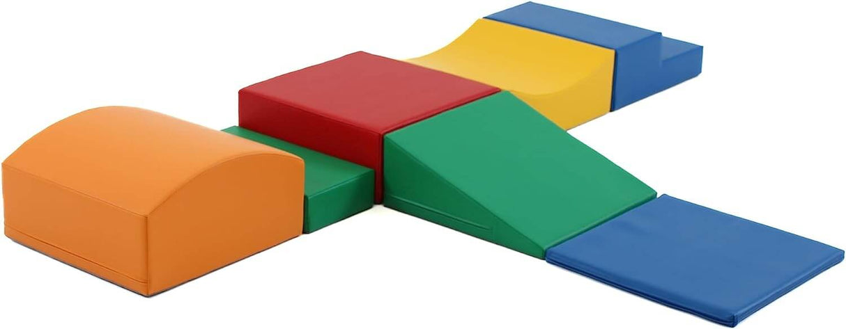 Bunte Schaumstoffbausteine in verschiedenen Formen und Farben angeordnet