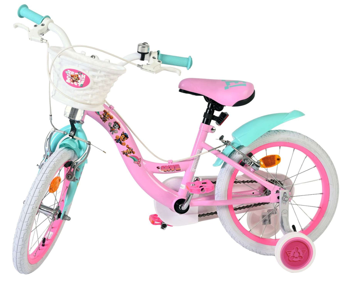 Rosa Kinderfahrrad mit Korb, weißen Reifen und bunten Details