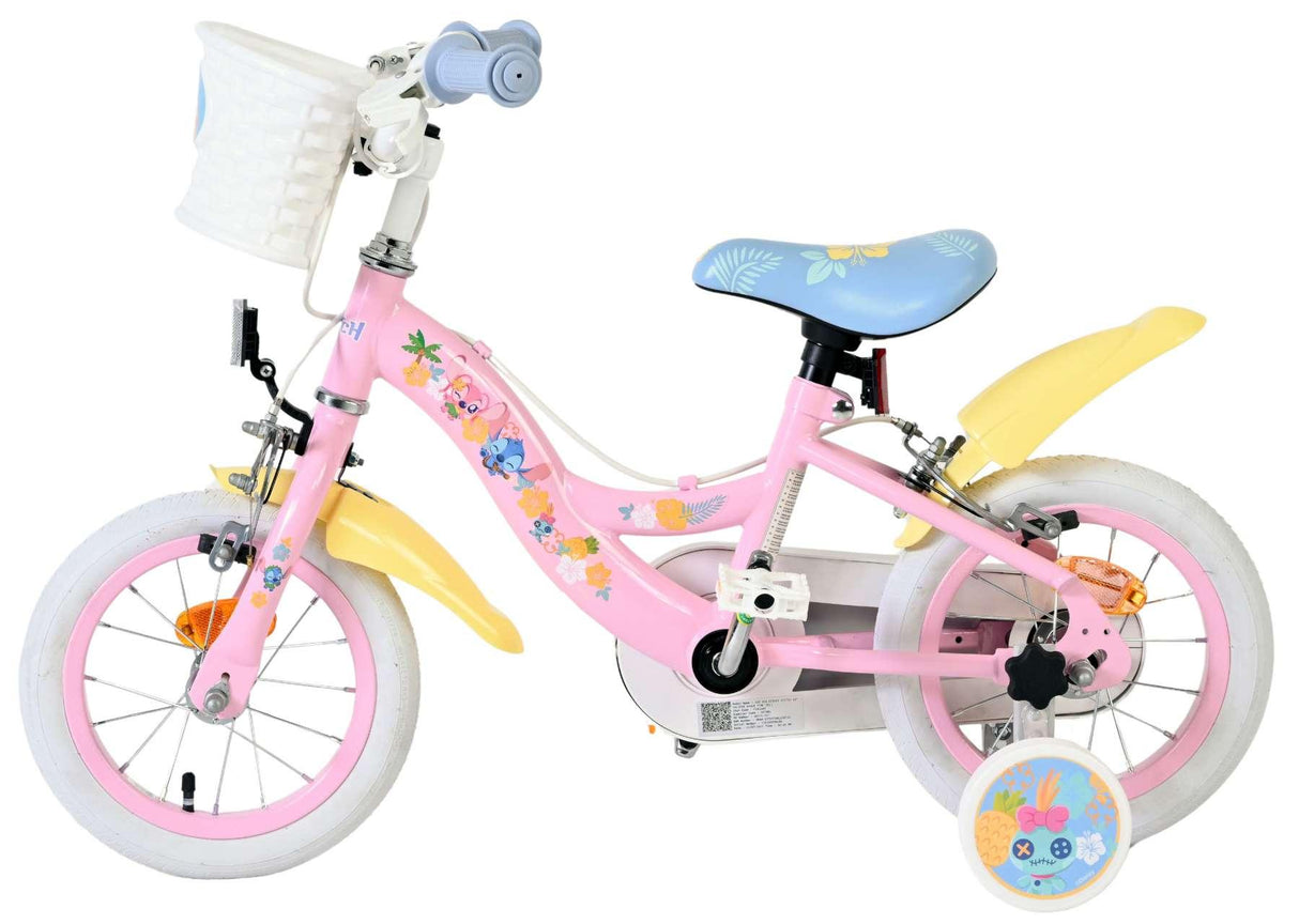 Rosa Kinderfahrrad mit Blumenmuster, Korb und weißen Reifen