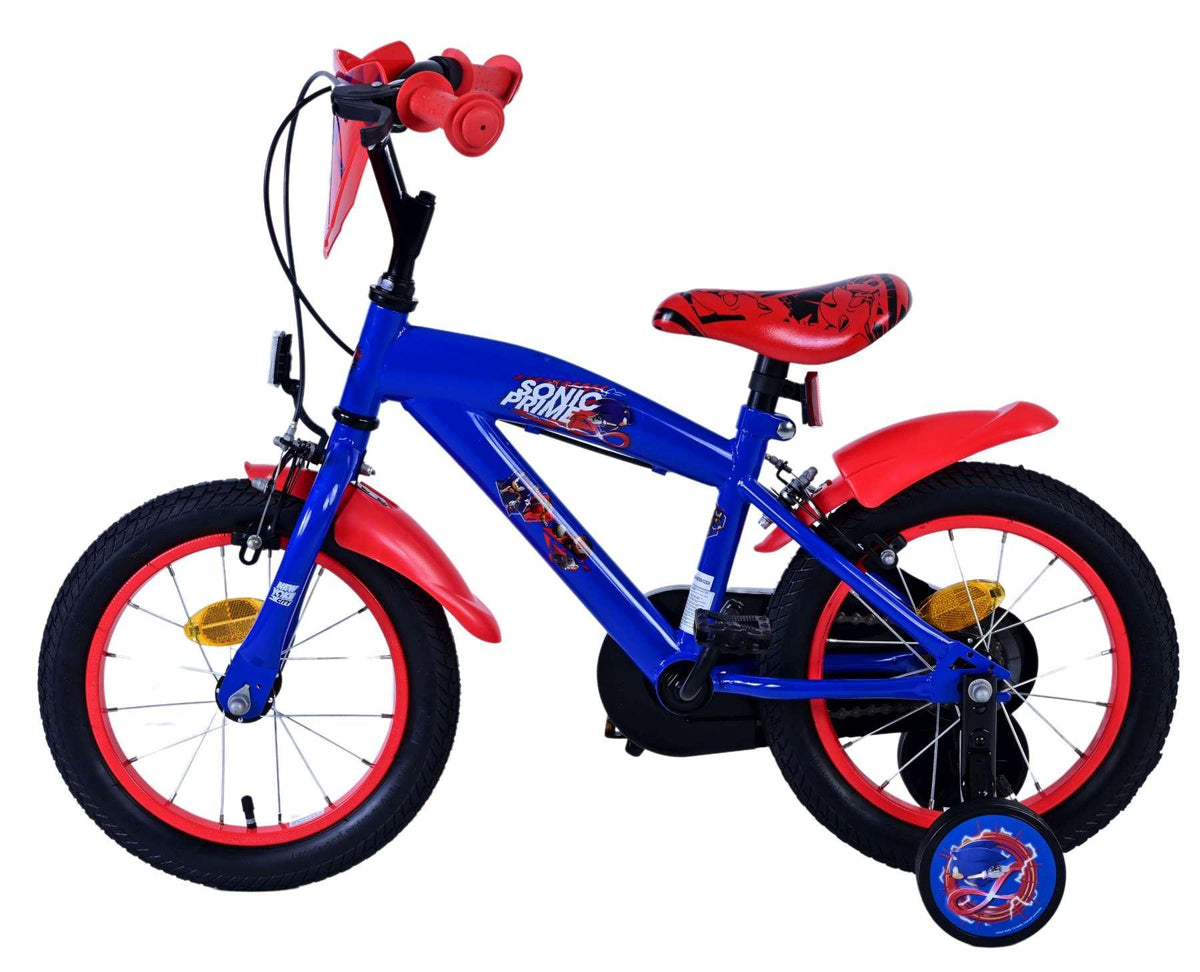 Blaues Kinderfahrrad mit roten Akzenten und stabilen Stützrädern