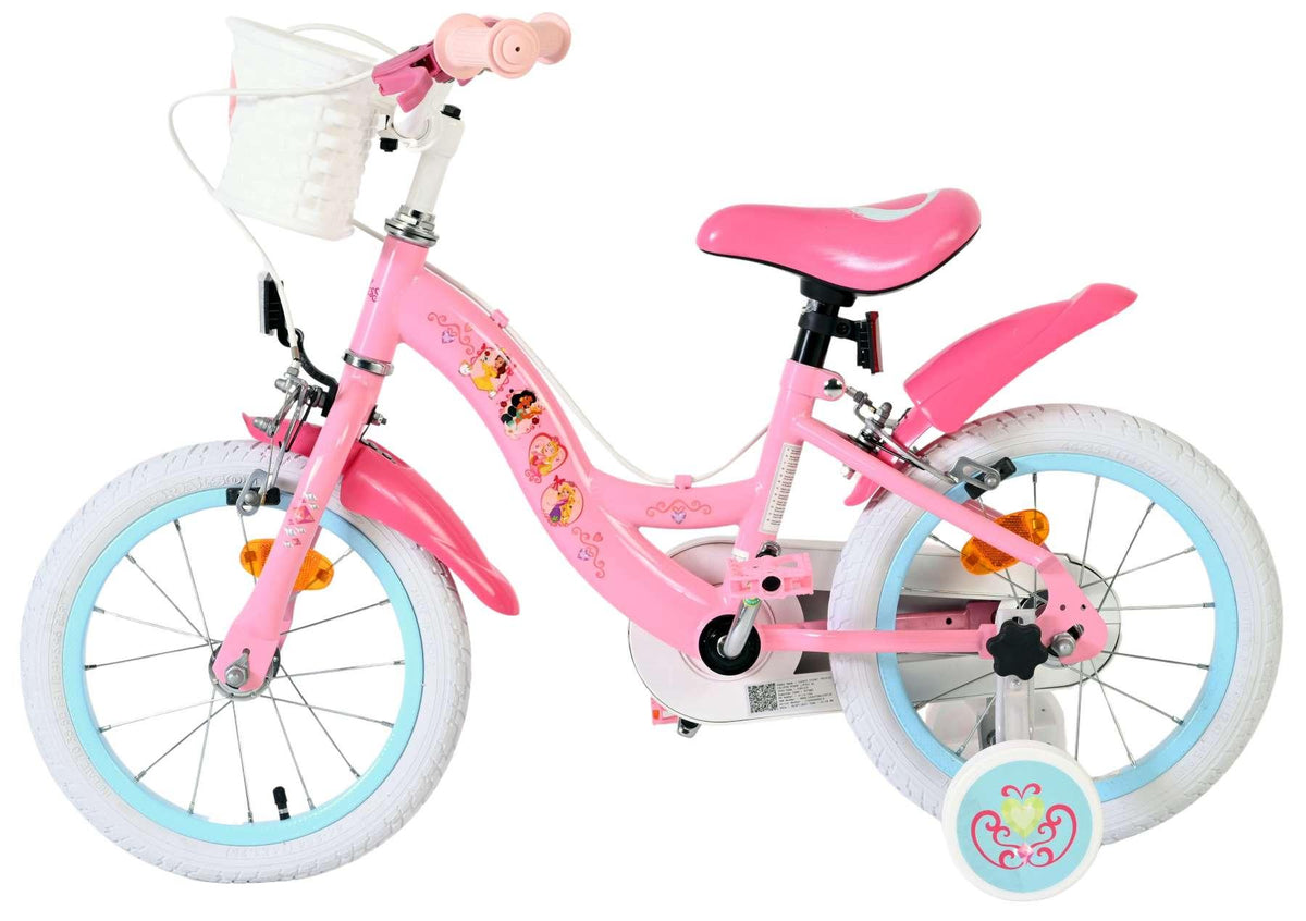 Rosa Kinderfahrrad mit weißen Reifen und Korb vorne