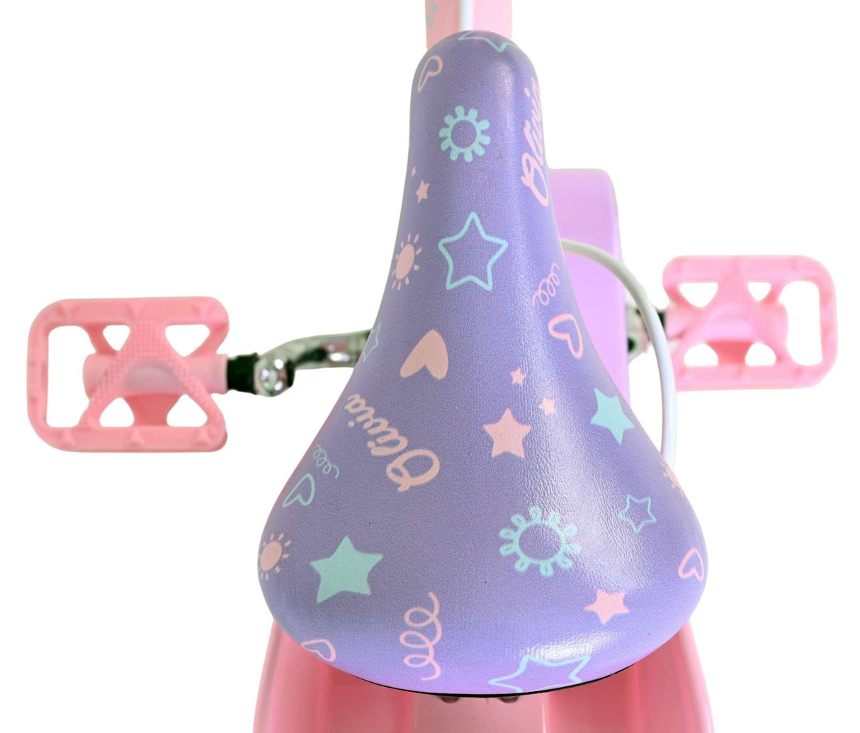 Kinderrad mit buntem Sattel und pinken Pedalen