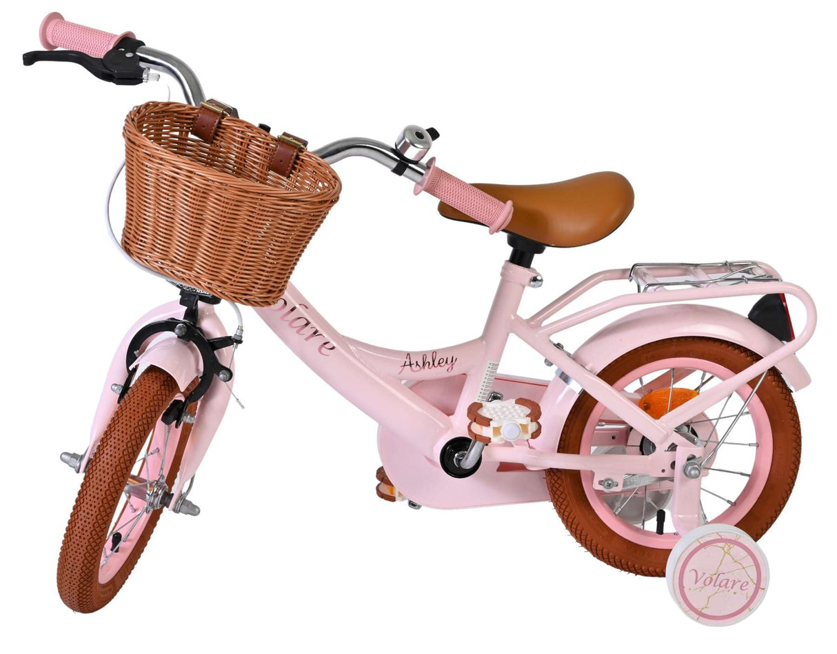 Rosa Kinderfahrrad mit Korb, braunen Reifen und gepolstertem Sattel