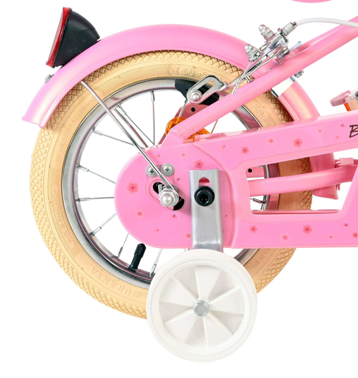 Rosa Fahrrad mit einem kleinen, hellen Reifen und verchromten Details