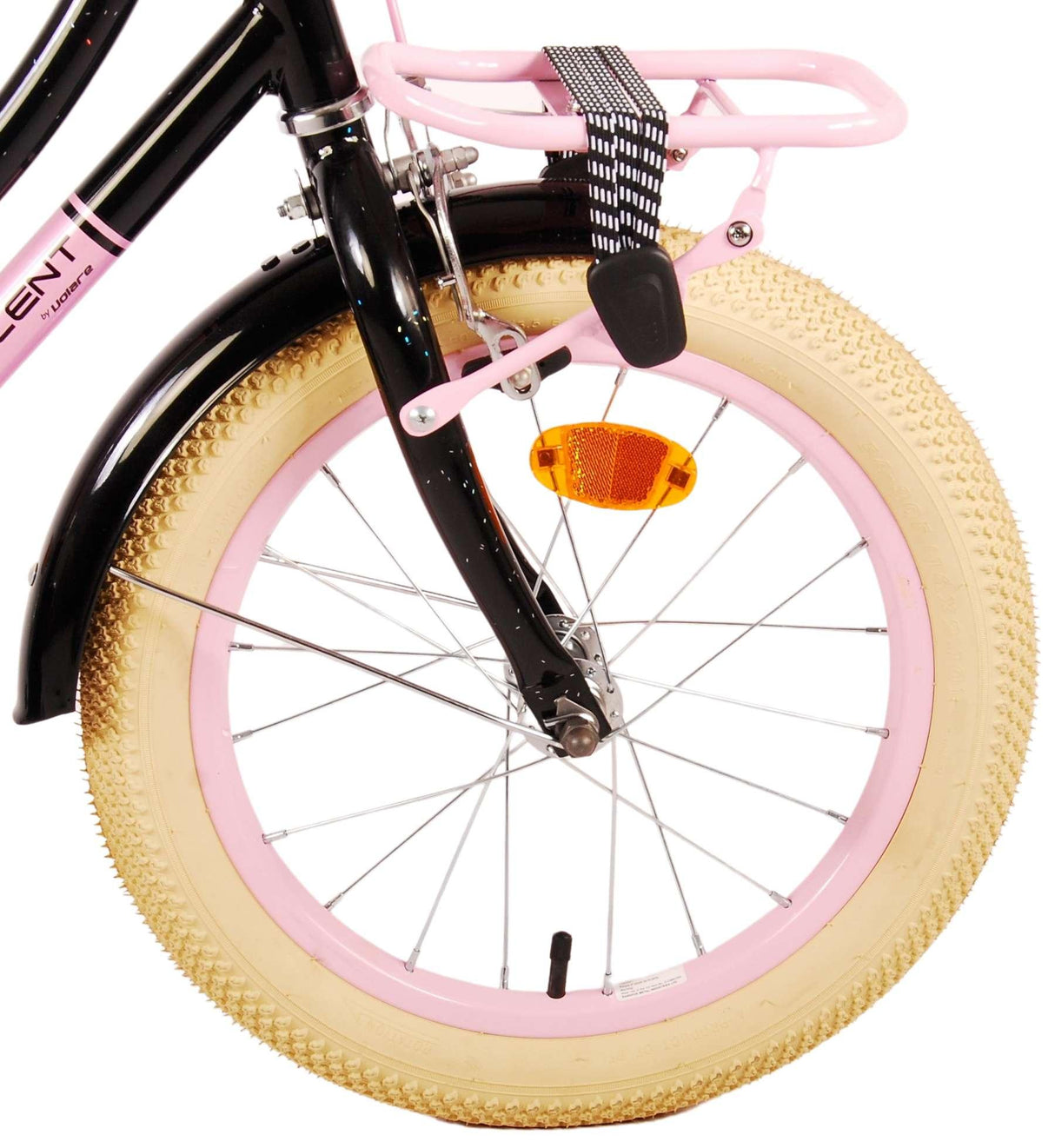 Schwarzes Fahrrad mit pinkem Gepäckträger und breitem, beigem Reifen