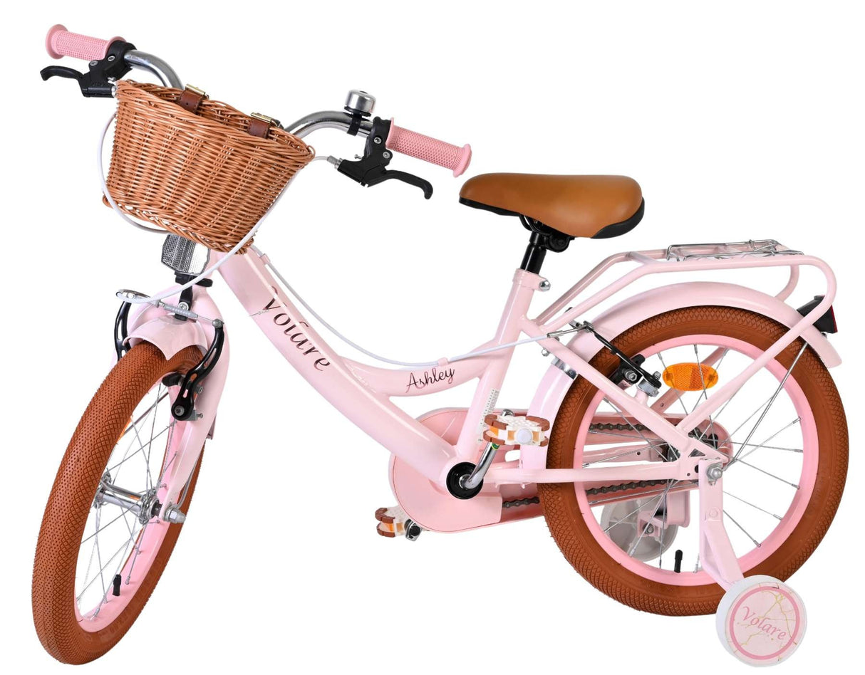 Rosa Kinderfahrrad mit Korb, braunem Sattel und dicken Reifen
