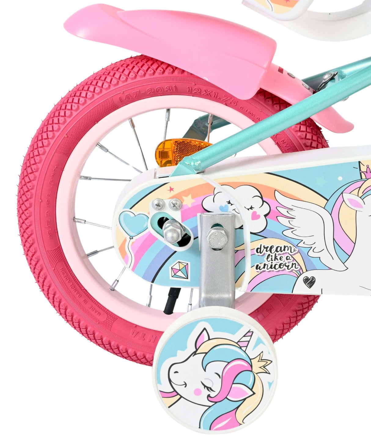 Kinderfahrrad mit pinken Reifen und Einhorn-Motiv auf dem Rahmen