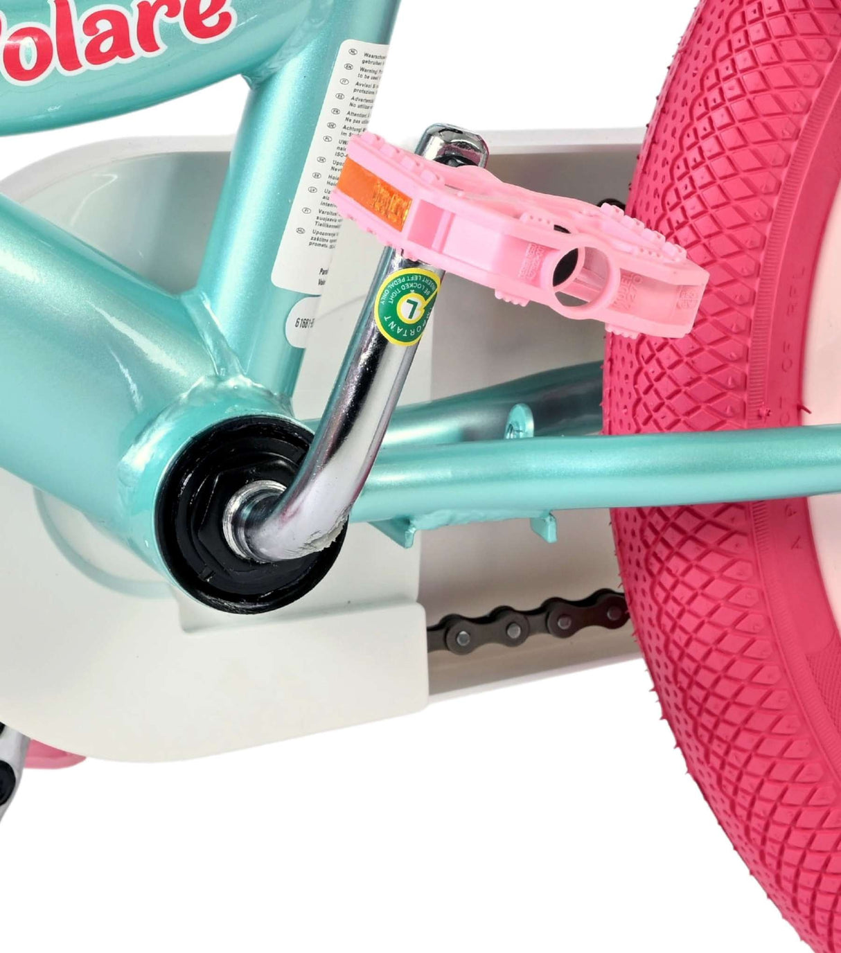 Buntes Kinderfahrrad mit pinken Reifen und Pedalen in Pastellfarbe