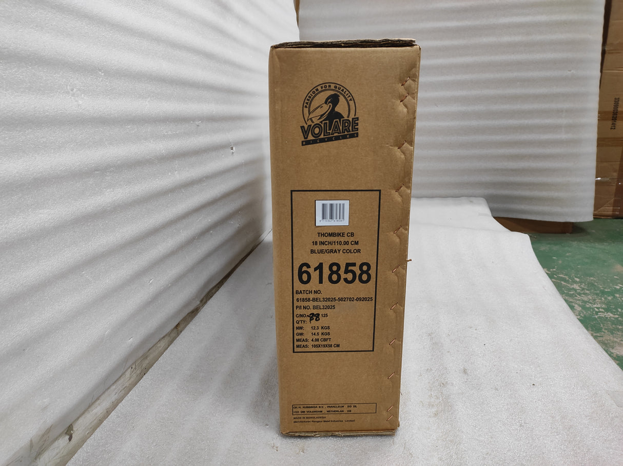 Braune Kartonverpackung mit Produktinformationen und Farbbezeichnung in Blaugrün