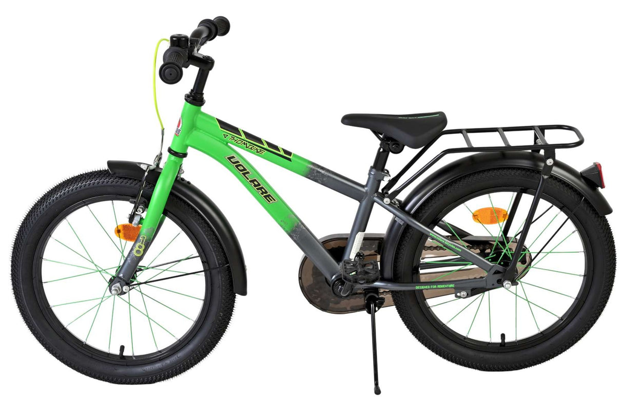 Kinderfahrrad in Grün mit stabilen Reifen und Gepäckträger