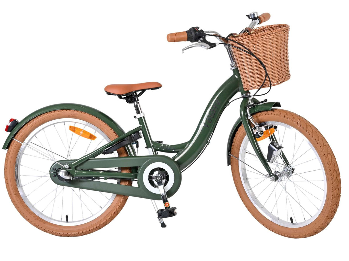 Damenfahrrad in Grün mit Korb und braunen Reifen