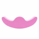 Pinkfarbener Yoga-Block in geschwungener Form für Unterstützung und Balance