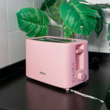 Jocca Toaster in Rosa in der Küche mit Pflanze