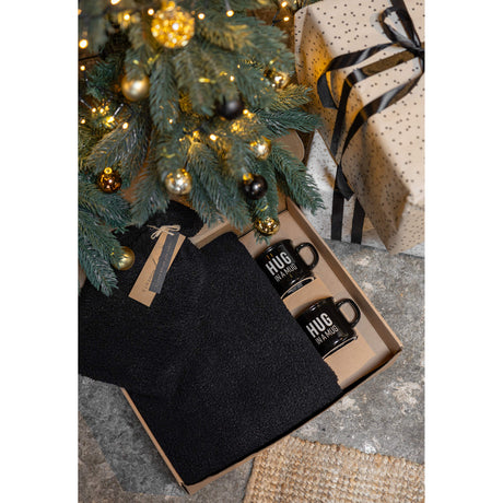 Geschenkset Schwarz unter dem Christbaum