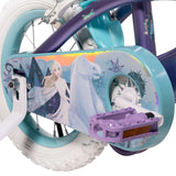 Fahrrad mit buntem Design, Einhorn und Märchenfigur auf dem Schutzblech