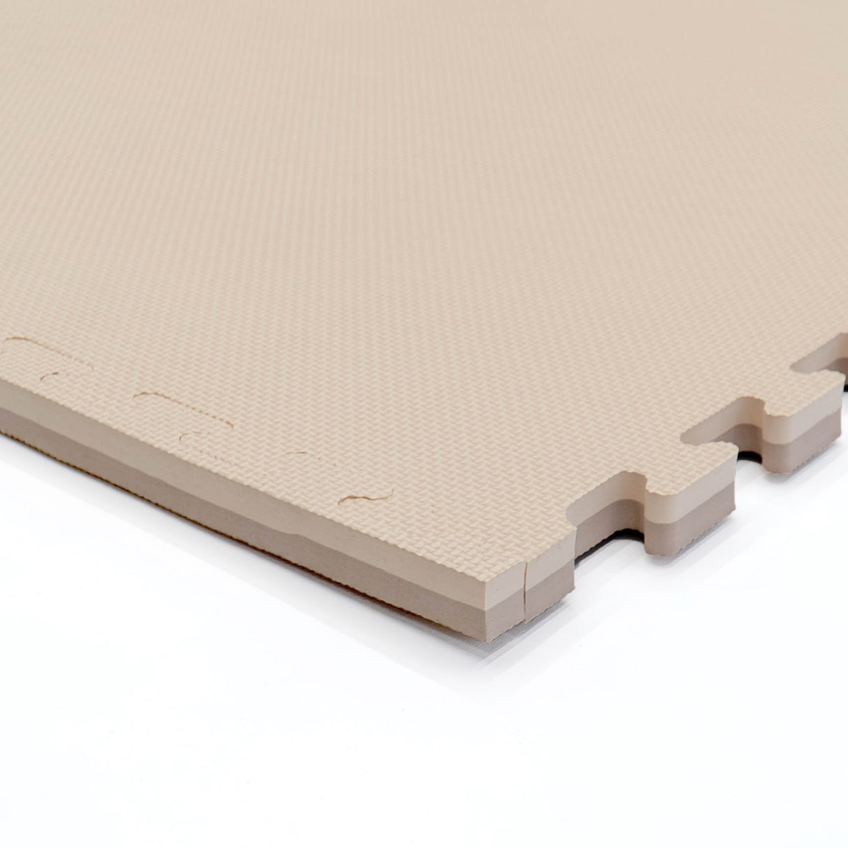 Beige, rutschfeste Bodenmatte mit Steckverbindungen und strukturiertem Muster