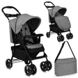 Grau gestreifter Kinderwagen mit verstellbarem Sonnendach und Tragetasche