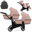 Zwillingskinderwagen-Set, Ansicht bestehend aus zwei 2-in-1 Kinderwagen in Pink mit schwarzem Rahmen und Tasche.