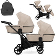 Zwillingskinderwagen-Set, Ansicht bestehend aus zwei 2-in-1 Kinderwagen in Creme mit schwarzem Rahmen und einer Tasche.