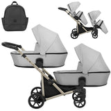 Zwillingskinderwagen-Set, Ansicht bestehend aus zwei 2-in-1 Kinderwagen in Silber mit schwarzem Rahmen und einer Tasche.