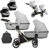 Zwillingskinderwagen-Set, Ansicht bestehend aus zwei 3-in-1 Kinderwagen in Silber mit schwarzem Rahmen sowie einer Tasche und 2x Kinderautositz.