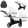 Zwillingskinderwagen-Set, Ansicht bestehend aus zwei 2-in-1 Kinderwagen in Weiß mit schwarzem Rahmen und einer Tasche.