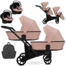 Zwillingskinderwagen-Set, Ansicht bestehend aus zwei 3-in-1 Kinderwagen in Pink mit schwarzem Rahmen sowie Tasche und 2x Kinderautositz.