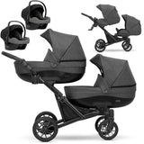 Zwillingskinderwagen-Set, Ansicht bestehend aus zwei 3-in-1 Kinderwagen in Graphit mit schwarzem Rahmen zwei Kinderautositzen.
