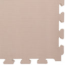 Beige Schaumstoffmatte mit strukturiertem Muster und Steckverbindungen