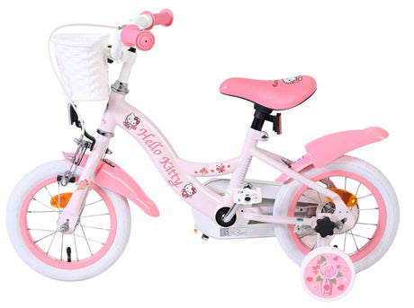 Rosa Kinderfahrrad mit Hello Kitty-Motiv und weißem Korb