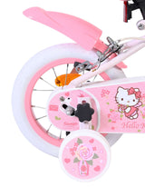 Rosa Kinderfahrrad mit Hello Kitty Motiven und weißen Reifen