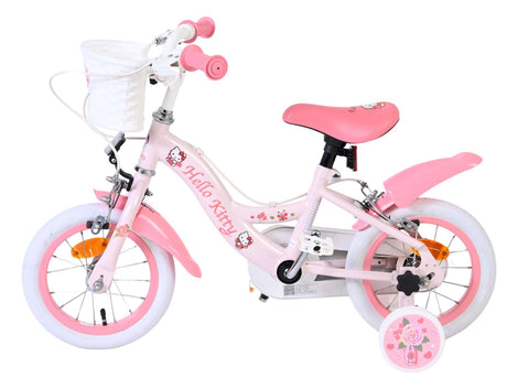 Rosa Kinderfahrrad mit Korb und Hello Kitty-Motiv