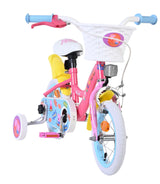 Rosa Kinderfahrrad mit Korb, Stützrädern und buntem Design