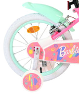 Fahrrad mit buntem Design, pinkem Rahmen und weißen Reifen