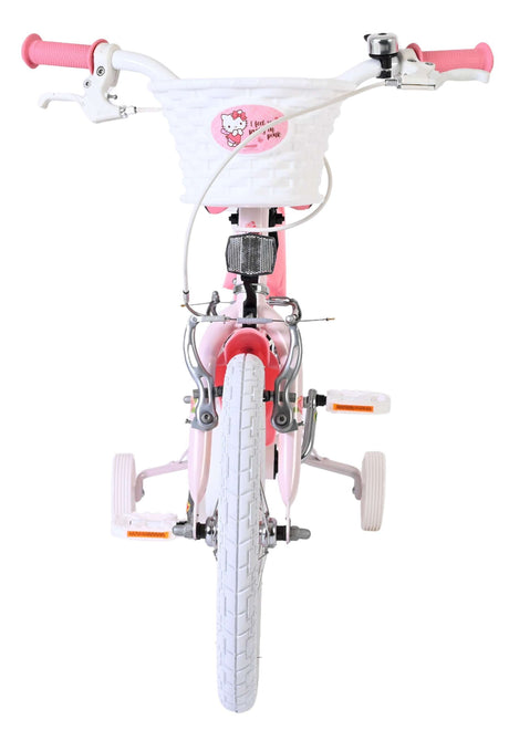 Rosa Kinderfahrrad mit Korb und weißen Reifen von vorne gesehen