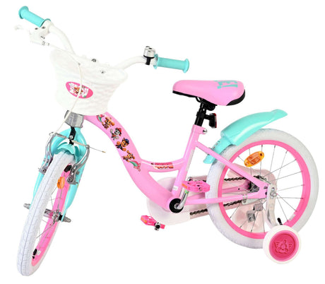 Rosa Kinderfahrrad mit weißem Korb und bunten Aufklebern