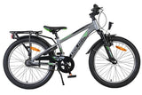 Mountainbike mit grauem Rahmen, grünen Akzenten und 20-Zoll-Rädern