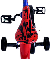 Rotes Kinderfahrrad mit grafischem Sattel und schwarzen Pedalen