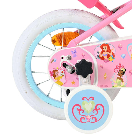 Rosa Kinderfahrrad mit Disney-Prinzessinnen-Aufklebern und Stützrädern