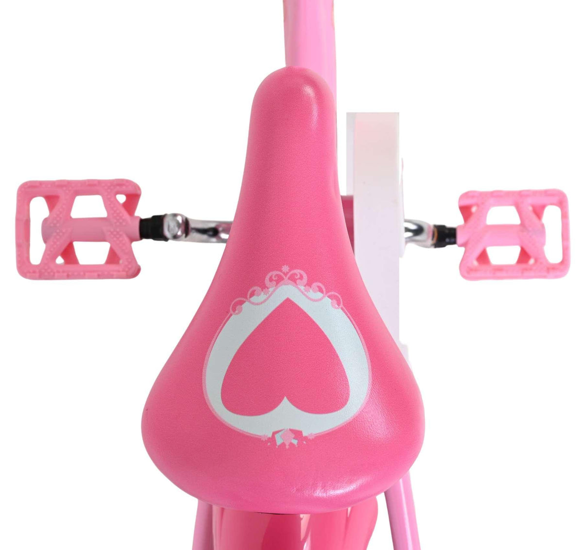 Rosa Kinderfahrradsattel mit Herzmotiv und pinken Pedalen