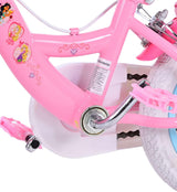 Rosa Kinderfahrrad mit Prinzessinnen-Aufklebern und weißen Reifen