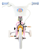 Kinderfahrrad mit pinkem Rahmen und weißem Korb vorne