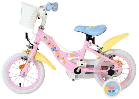 Rosa Kinderfahrrad mit Blumenmuster, Korb und weißen Reifen