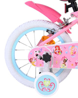 Rosa Kinderfahrrad mit bunten Aufklebern und weißen Reifen