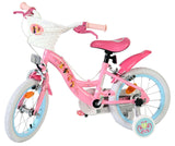 Rosa Kinderfahrrad mit Korb und bunten Aufklebern