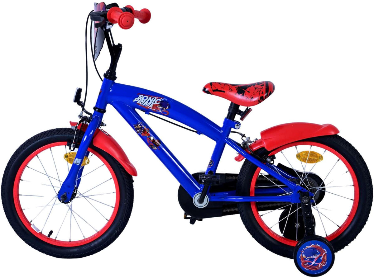 Blaues Kinderfahrrad mit roten Akzenten und stabilen Reifen