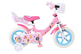 Rosa Kinderfahrrad mit weißen Reifen und Korb, dekoriert mit bunten Motiven